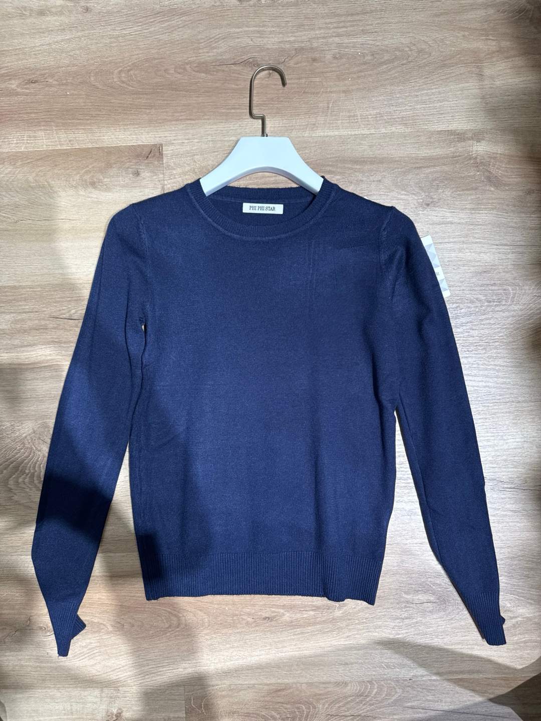 Maglia blu slavato girocollo a maniche lunghe