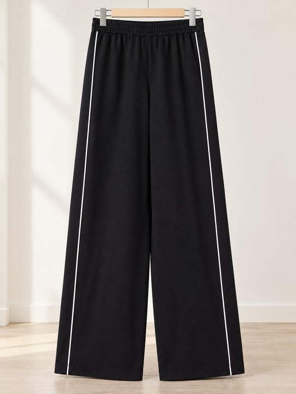 Pantaloni palazzo con profili a contrasto