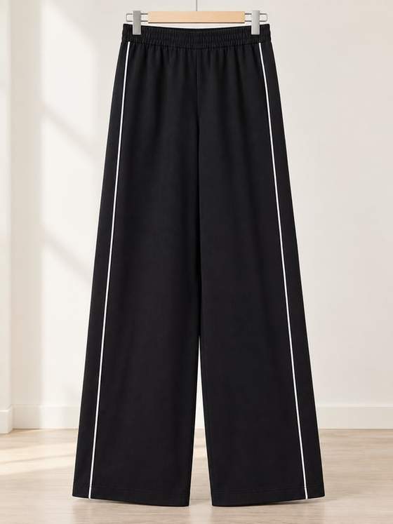 Pantaloni palazzo con profili a contrasto