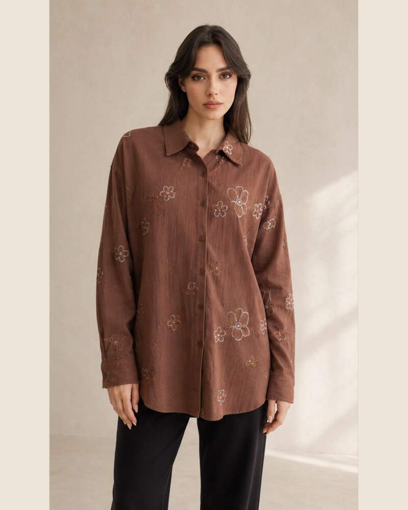 Camicia ampia con motivi floreali in paillettes