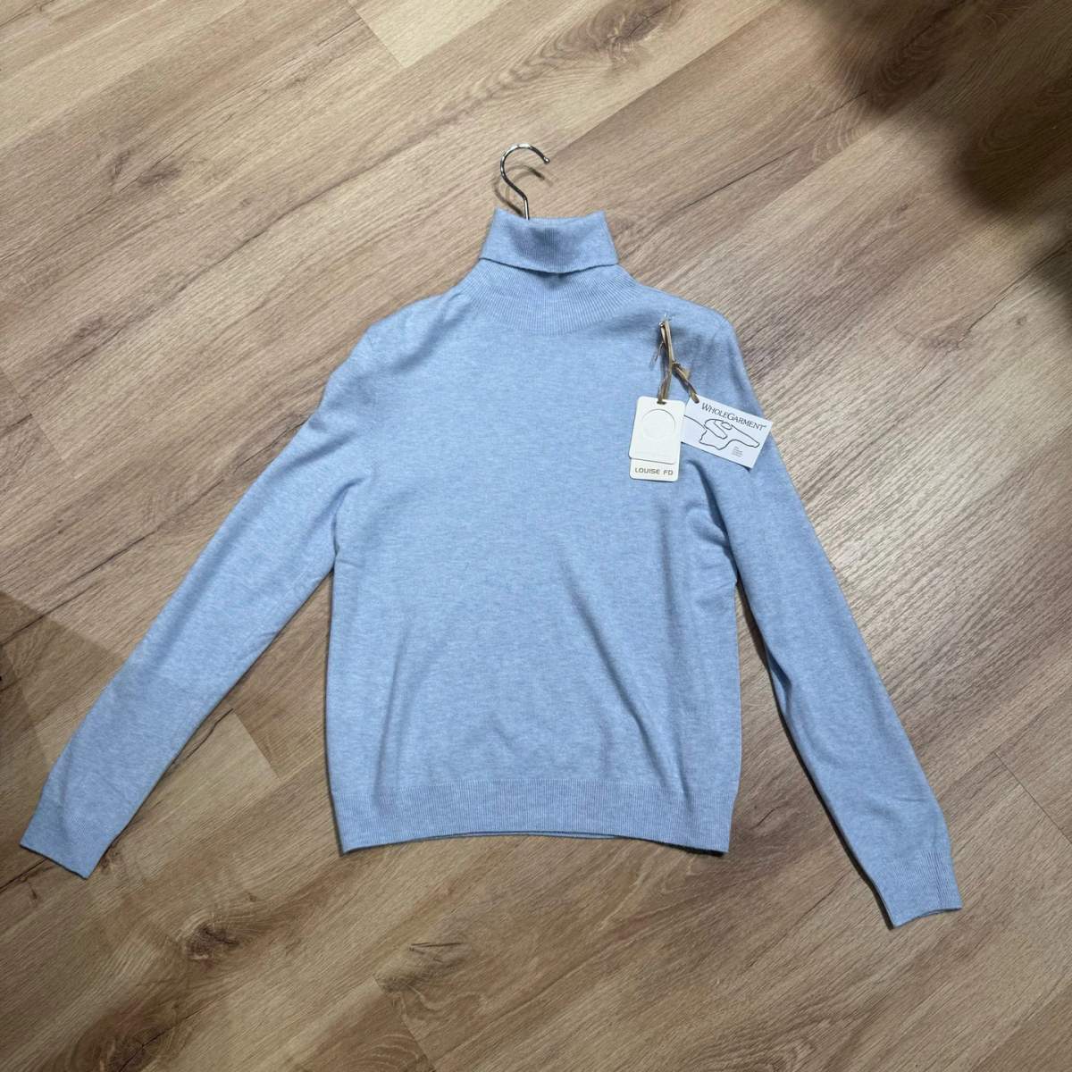 Maglia donna a collo alto color azzurro cielo