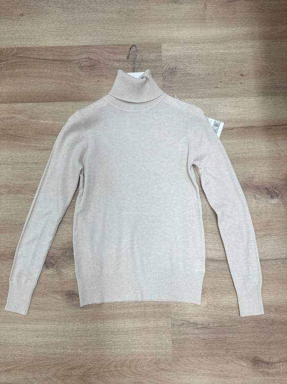 Maglia dolcevita color panna