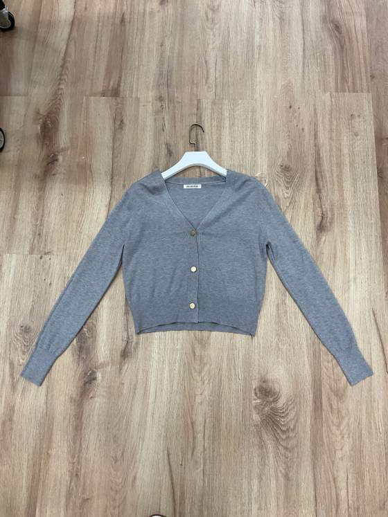 Cardigan corto grigio con scollo a V