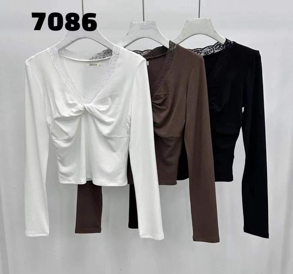 Top da donna a manica lunga con bordo in pizzo