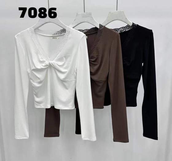 Top da donna a manica lunga con bordo in pizzo