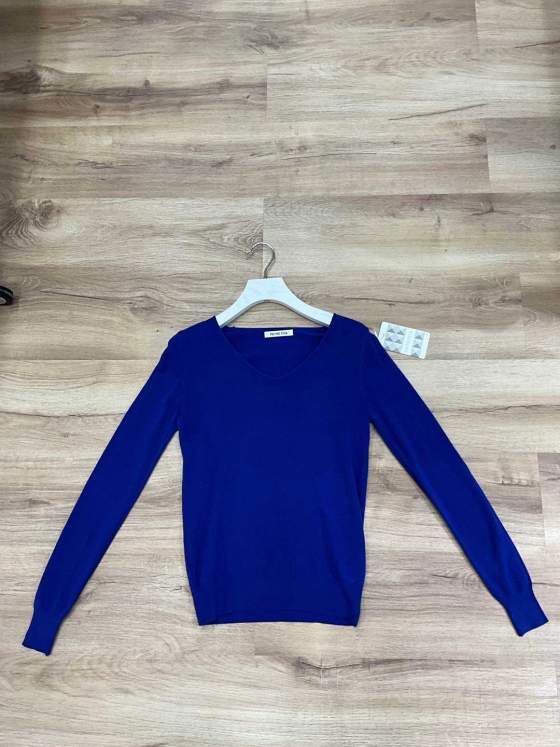 Top a maniche lunghe con scollo a V